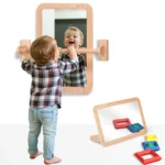 Wall mounted mirror with handrail and matching floor mirror in a nursery