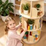 Girl spinning the round bookshelf to reach a book on the top tier