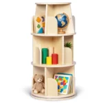 Round three-tier rotating bookshelf filled with books and plants