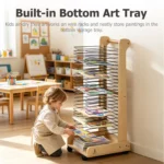 Child loading paintings onto the rack with the built-in bottom tray