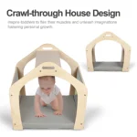 Baby crawling through the house-shaped play structure and its smaller companion