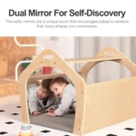 Two children discovering their reflections in the built-in playhouse mirrors