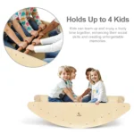 Four kids sharing the rocking boat seesaw in the classroom
