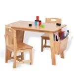 Kids table and chairs set holding crayons, blocks and art supplies
