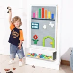 Child building on the rectangular wall panel with a storage box below