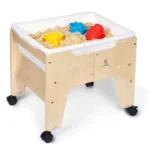 Rolling kids sand and water table filled with play sand